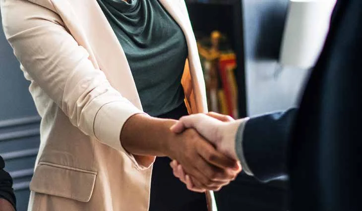 Business partners shaking hands