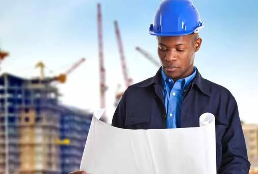 Engineer reviewing project plans
